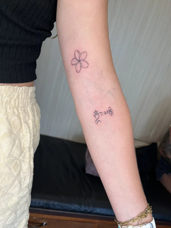 floral fine line lotus soft shading minimal spiritual elegant bold line tattoo Canggu Bali