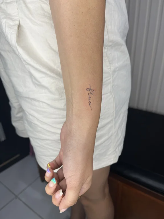 religious minimalist woman fine line minimal elegant thin line spiritual tattoo Canggu Bali