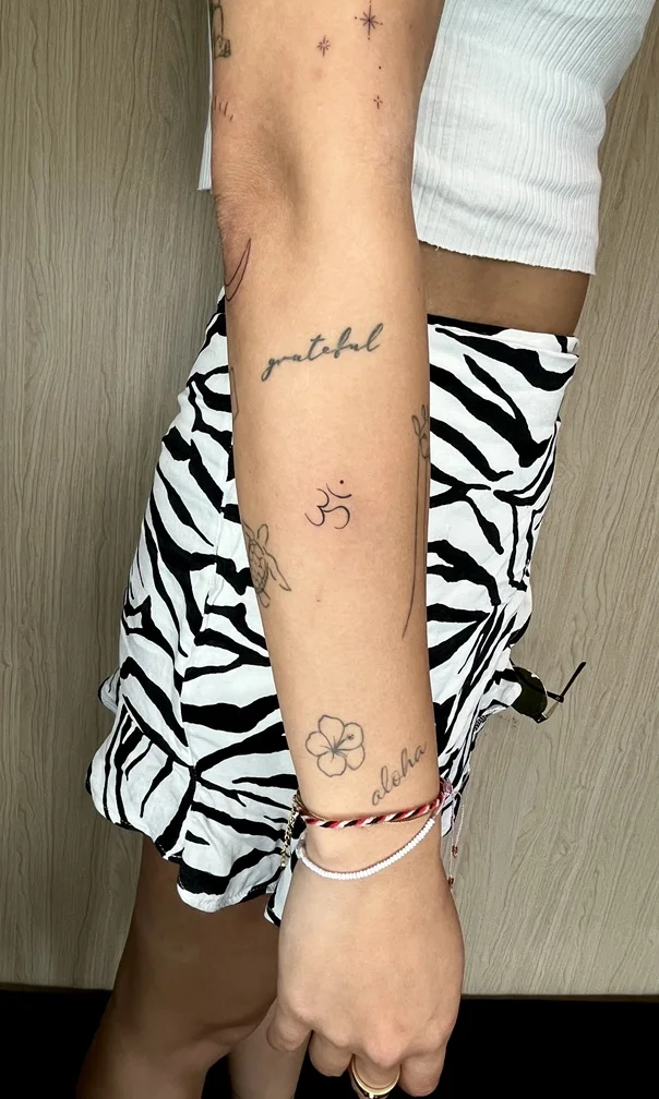woman hand arm minimalist religious elegant fineline fine line linework line tattoo small bali tattoo canggu bali