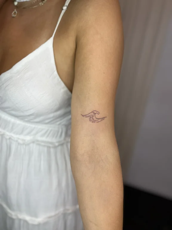 symbol minimalist angel fine line minimal wave elegant soft shading tattoo Canggu Bali