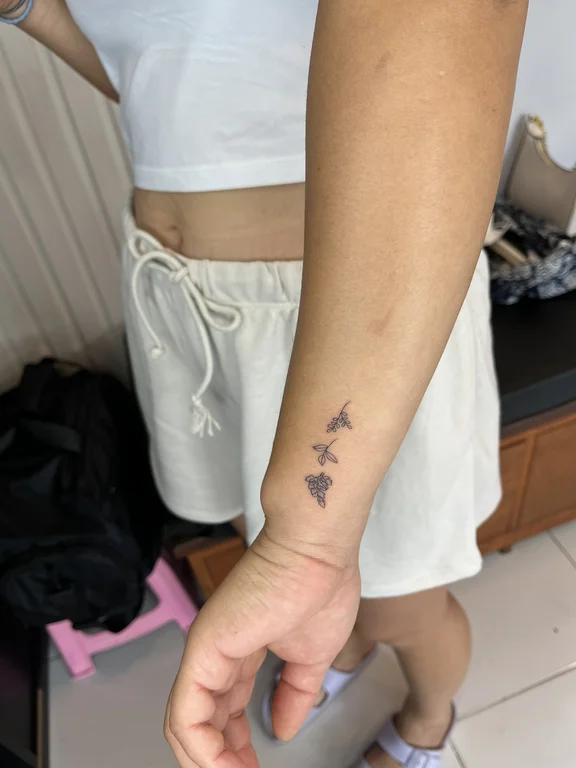 symbol minimalist butterfly fine line minimal elegant soft shading spiritual tattoo Canggu Bali