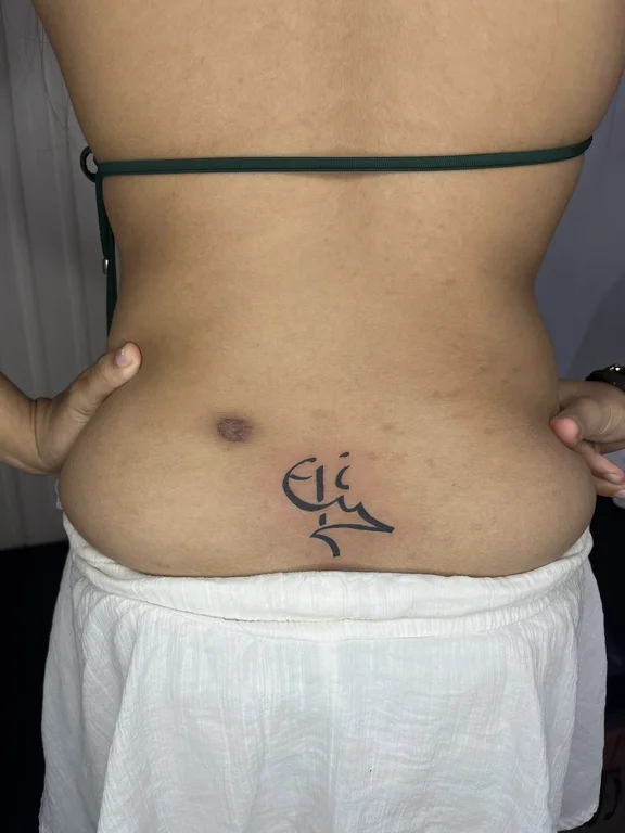 symbol minimalist deity fine line moon bold line minimal linework tattoo Canggu Bali