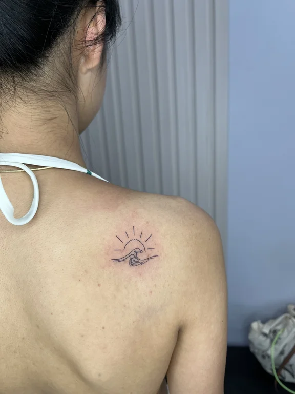 symbol minimalist eye dotwork sun minimal fine line soft shading tattoo Canggu Bali
