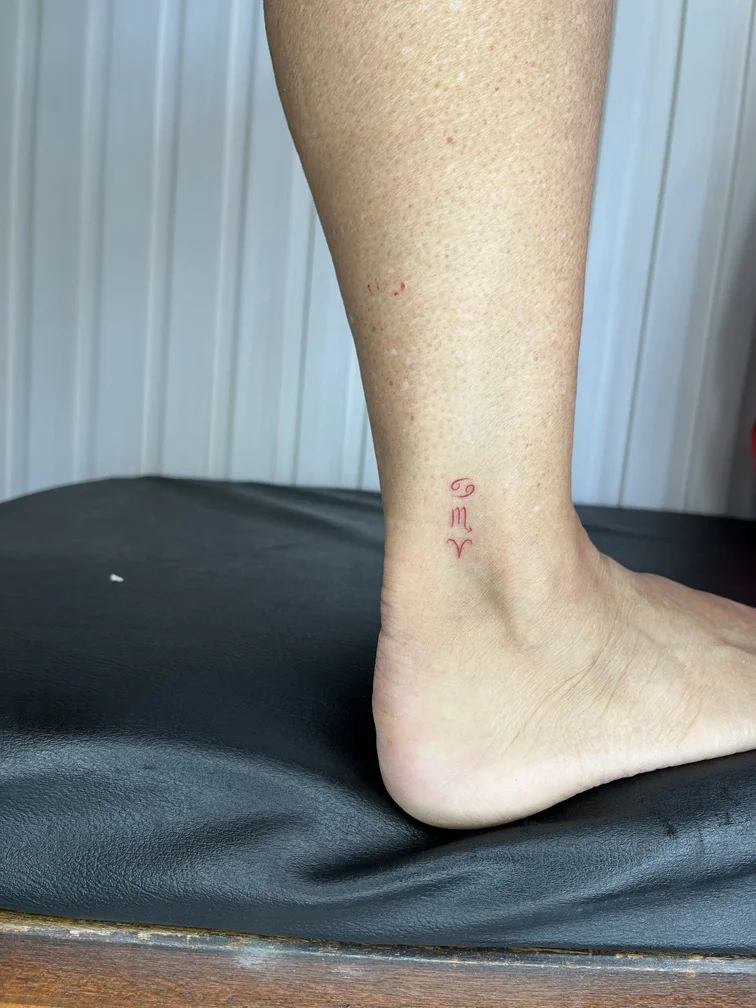 foot small zodiac minimalist symbol fine line line work line red tattoo canggu bali