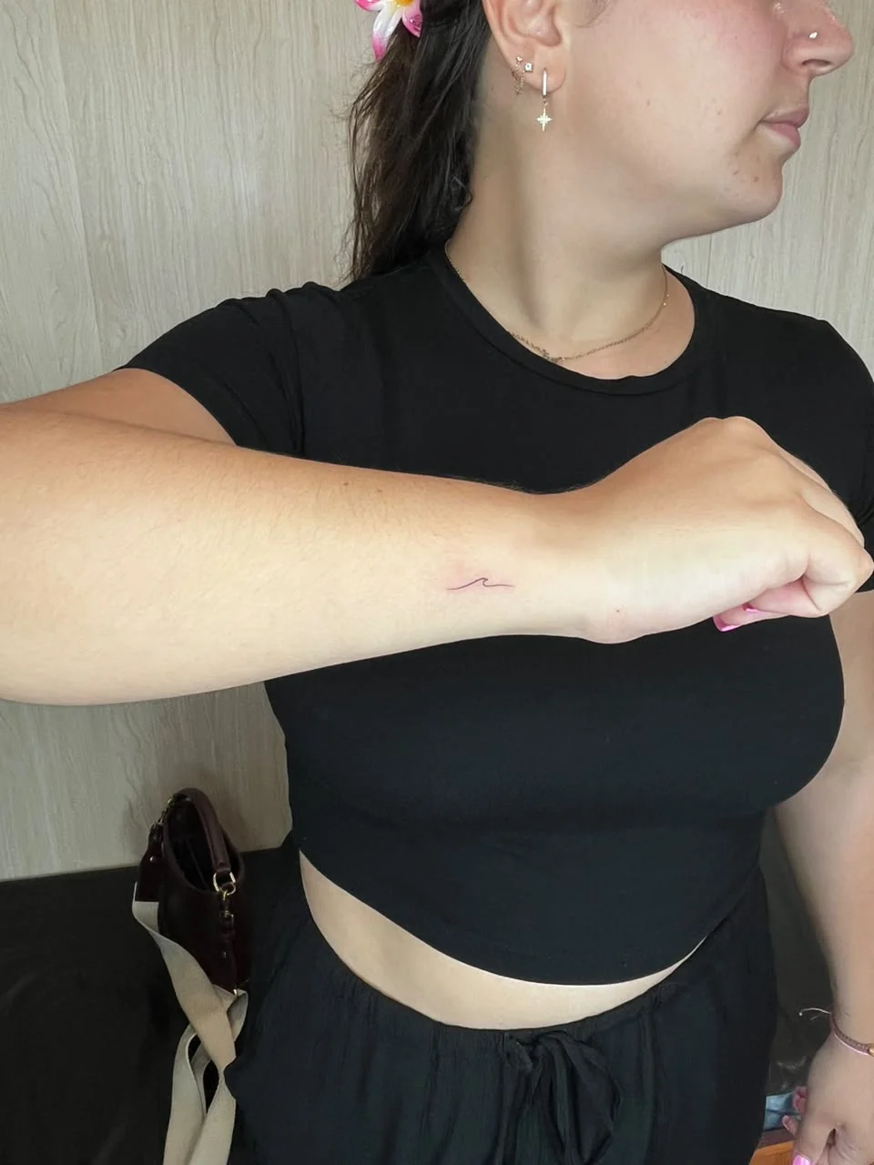 woman hand small minimalist symbol wave fine line line work line tattoo canggu bali