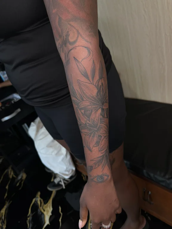 abstract neo traditional lotus linework elegant heavy shading black grey soft shading tattoo Canggu Bali