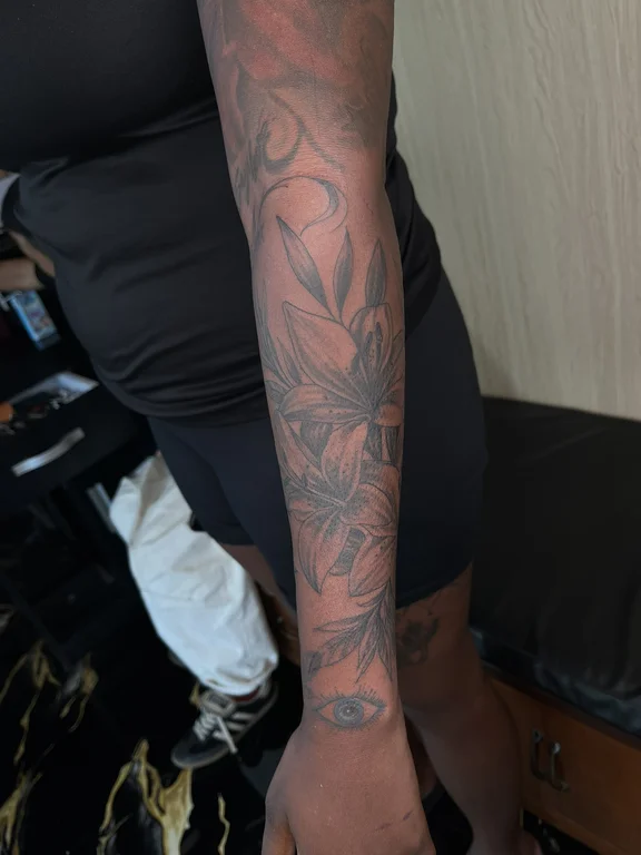 floral neo traditional peony linework elegant black grey heavy shading soft shading tattoo Canggu Bali