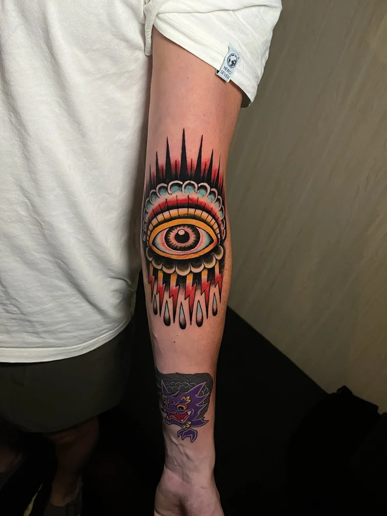 traditional american old tattoo eye color man hand colorfull tattoo canggu bali
