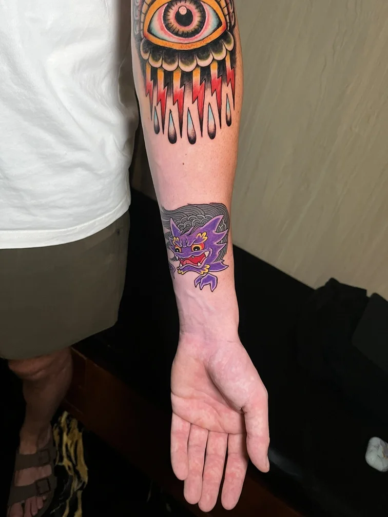 traditional american purple dragon man color tattoo hand tattoo canggu bali