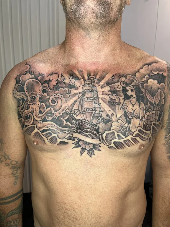 religious neo traditional deity linework spiritual buddha black grey heavy shading tattoo Canggu Bali