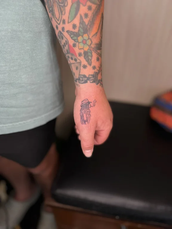 abstract new school hand black grey cloud dotwork colorful snake tattoo Canggu Bali