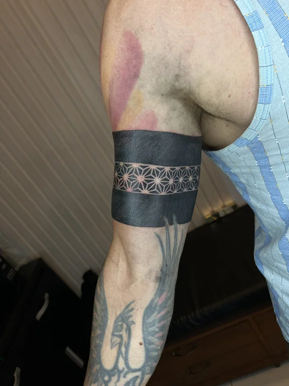 abstract new school man dotwork cloud black grey linework heavy shading tattoo Canggu Bali