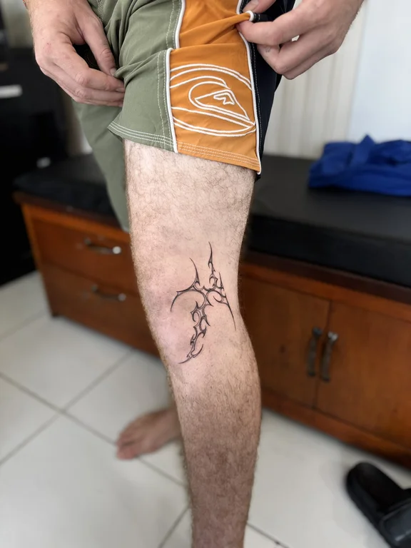 abstract new school man fine line fire linework bold line soft shading tattoo Canggu Bali