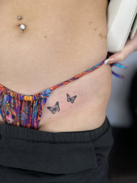 animal new school butterfly colorful elegant fine line soft shading woman tattoo Canggu Bali
