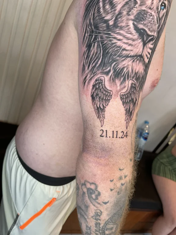 animal new school lion black grey cloud heavy shading fire dotwork tattoo Canggu Bali