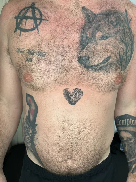 animal new school man black grey smoke lion cloud heavy shading tattoo Canggu Bali