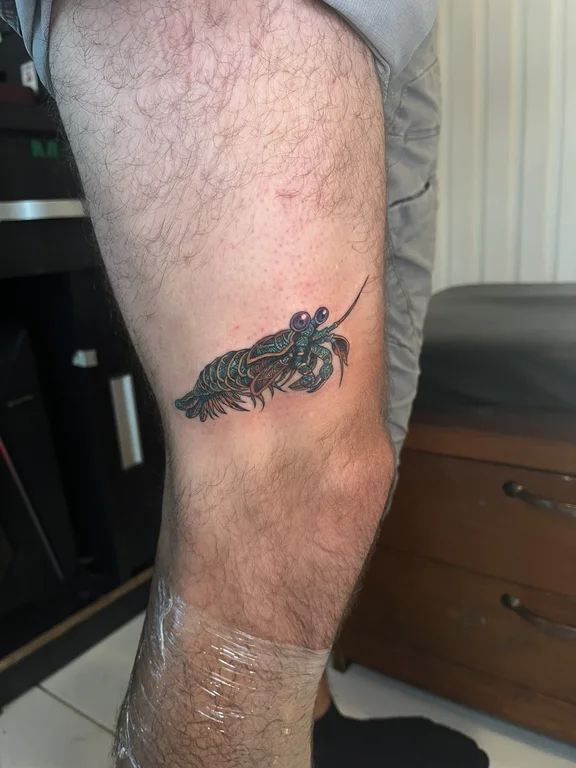 animal new school man fine line wave colorful linework snake tattoo Canggu Bali