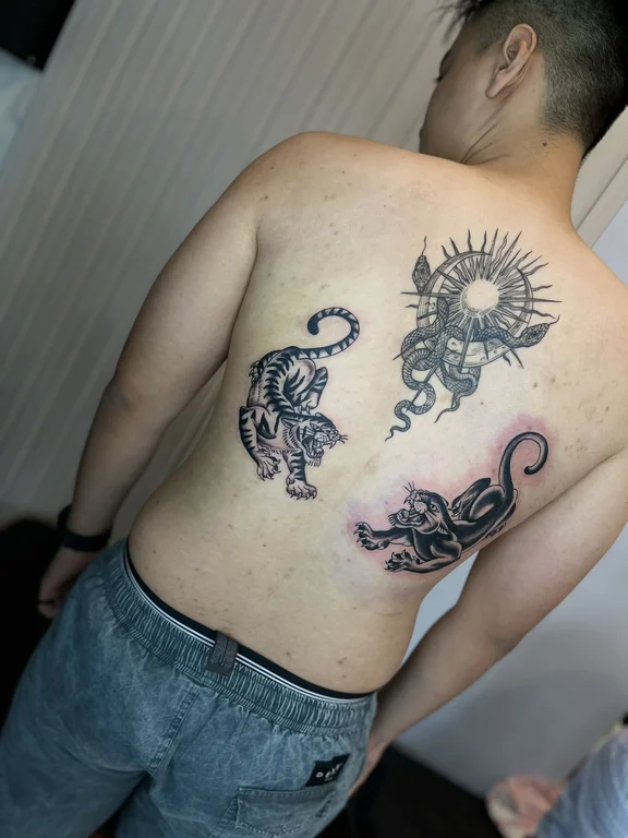 animal new school snake dotwork sun spiritual mystical black grey tattoo Canggu Bali