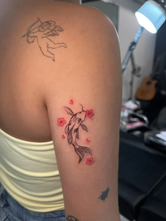 floral new school koi soft shading flower elegant colorful woman tattoo Canggu Bali