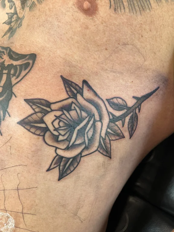 floral new school rose black grey elegant dotwork soft shading linework tattoo Canggu Bali
