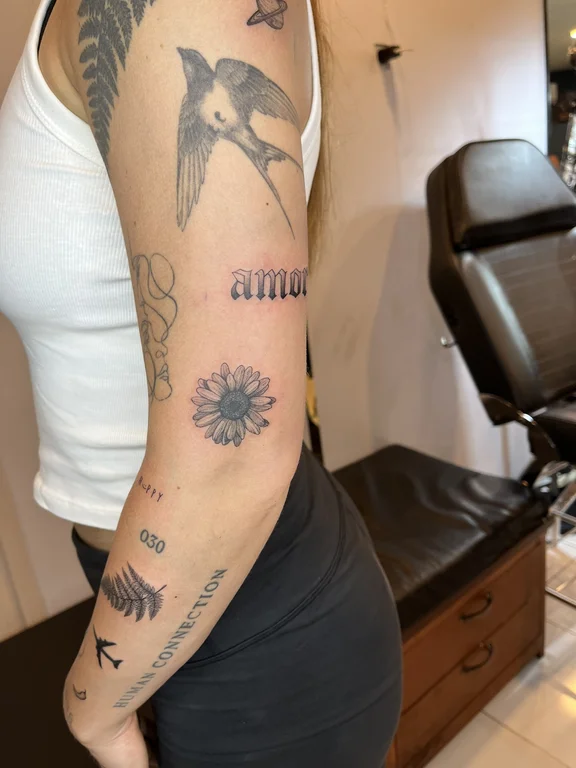 floral new school woman black grey sun elegant soft shading dotwork tattoo Canggu Bali