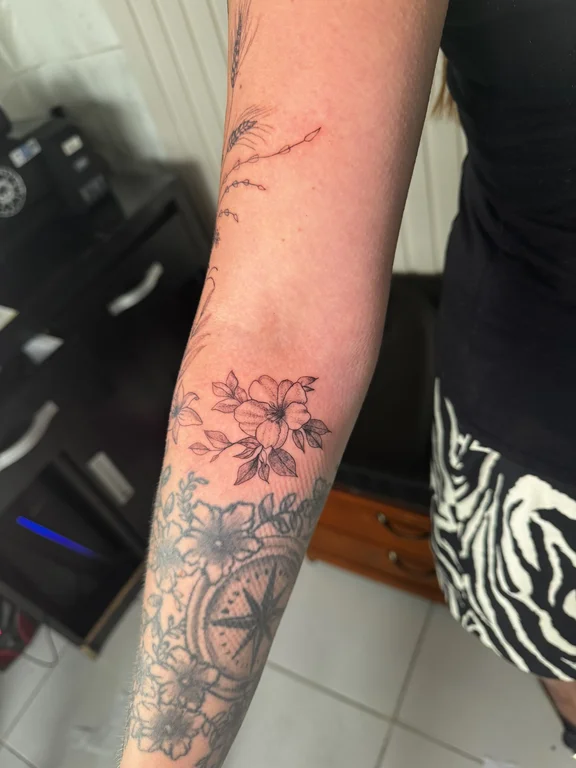 floral new school woman soft shading fire linework flower sun tattoo Canggu Bali