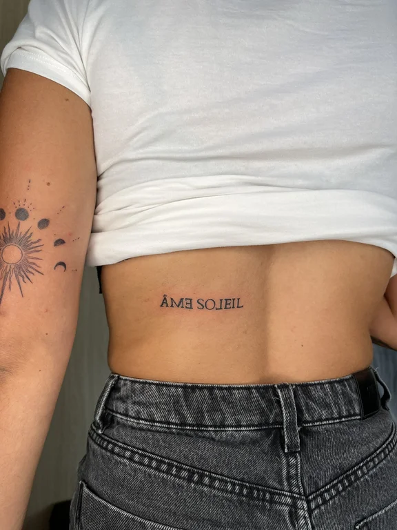 floral new school woman soft shading sun minimal spiritual elegant tattoo Canggu Bali