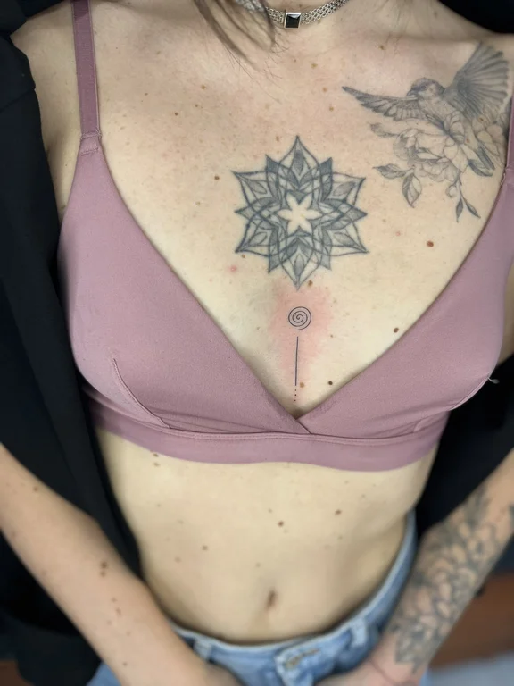 geometric new school lotus dotwork spiritual sun fine line elegant tattoo Canggu Bali