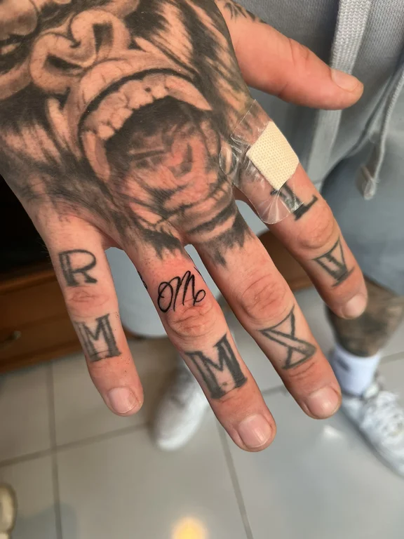 lettering new school hand bold line horror man heavy shading demon tattoo Canggu Bali