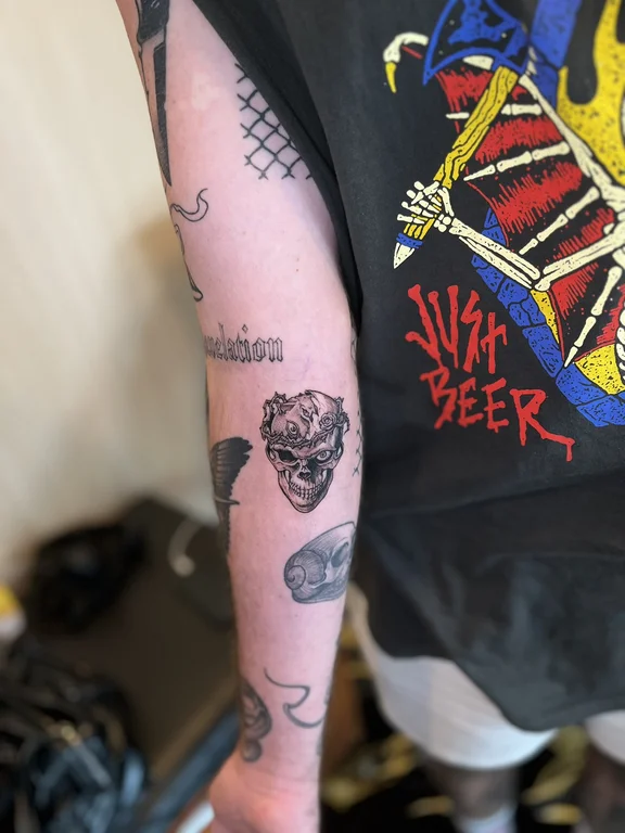 lettering new school man black grey cloud horror linework colorful tattoo Canggu Bali