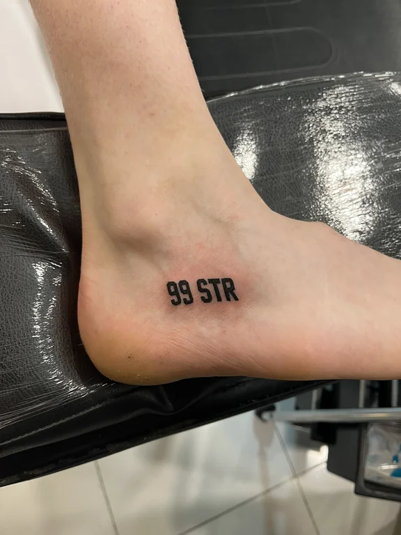 lettering new school man soft shading minimal fine line black grey heavy shading tattoo Canggu Bali