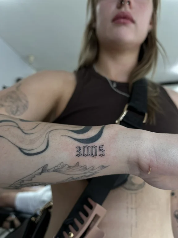 lettering new school woman bold line fire black grey fine line dark tattoo Canggu Bali