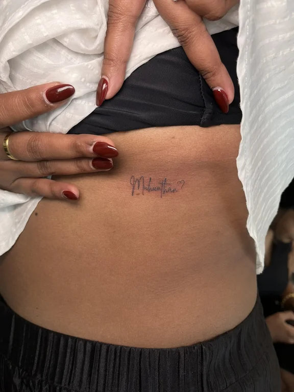 lettering new school woman fine line elegant bold line thin line soft shading tattoo Canggu Bali
