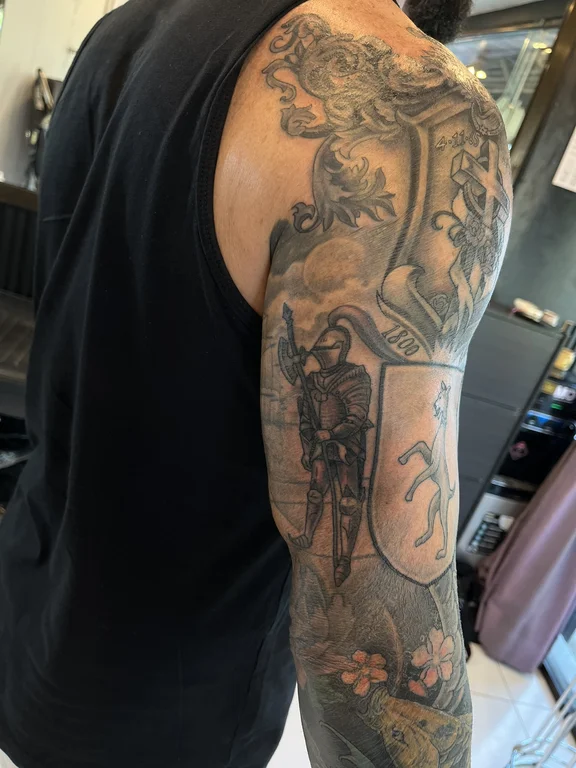mythology new school man black grey cloud heavy shading linework deity tattoo Canggu Bali