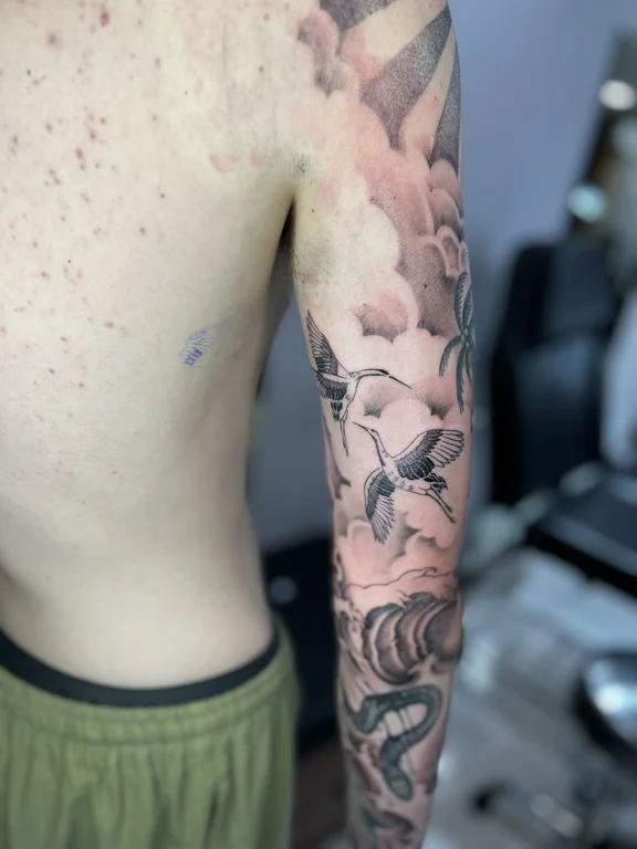 mythology new school man soft shading cloud heavy shading black grey elegant tattoo Canggu Bali