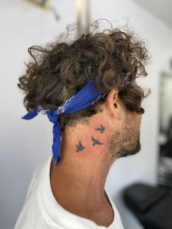 portrait new school man colorful cloud wave phoenix smoke tattoo Canggu Bali