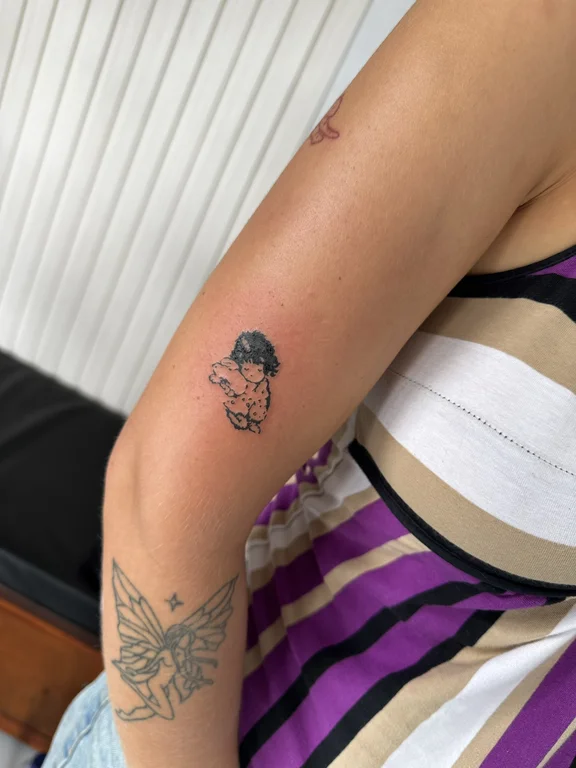 portrait new school woman fine line cloud minimal moon elegant tattoo Canggu Bali