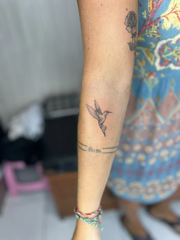 religious new school angel soft shading elegant fine line spiritual phoenix tattoo Canggu Bali