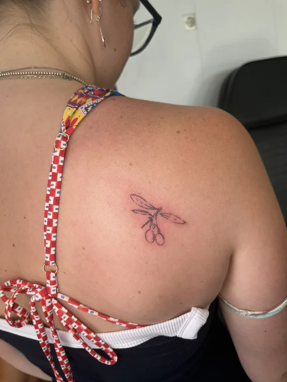 symbol new school butterfly fine line sun linework bold line dotwork tattoo Canggu Bali
