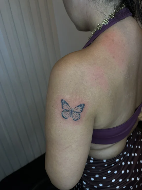 symbol new school butterfly soft shading elegant dotwork fine line black grey tattoo Canggu Bali