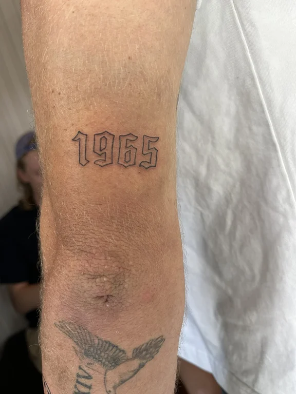 lettering old school man heavy shading minimal fine line dotwork soft shading tattoo Canggu Bali