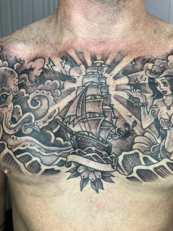 mythology old school man black grey cloud heavy shading wave linework tattoo Canggu Bali