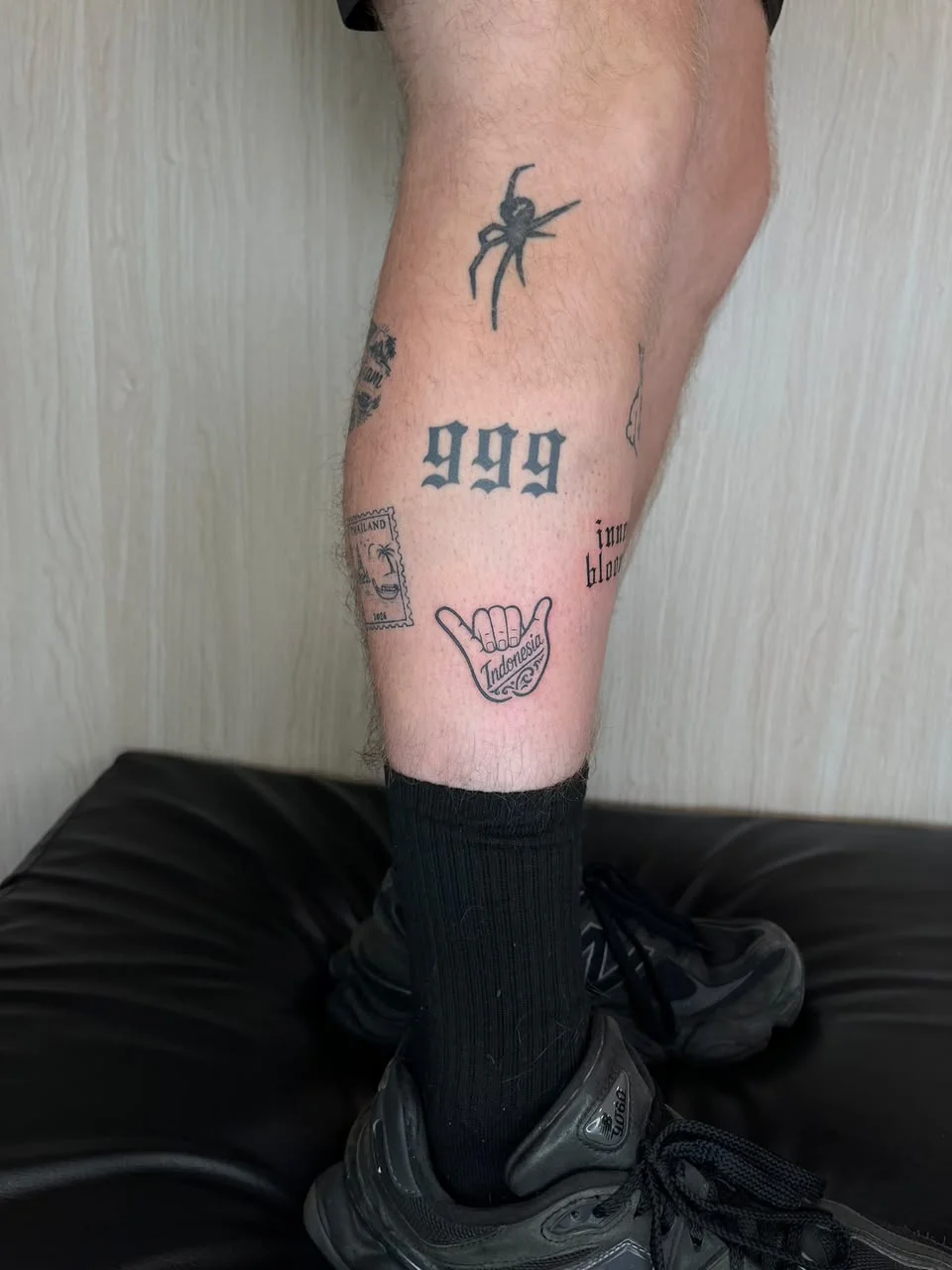 man leg foot old school symbol black black work tattoo canggu bali