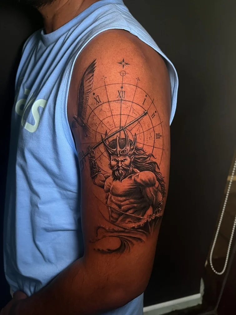 neptunus realism mythology man hand black linework blackwork tattoo canggu bali
