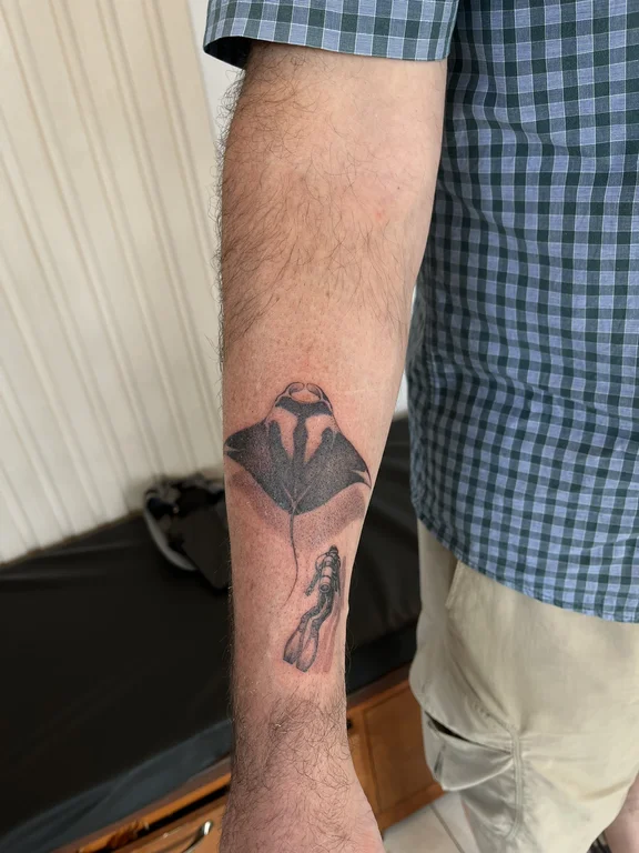 abstract surreal man black grey smoke dotwork soft shading linework tattoo Canggu Bali