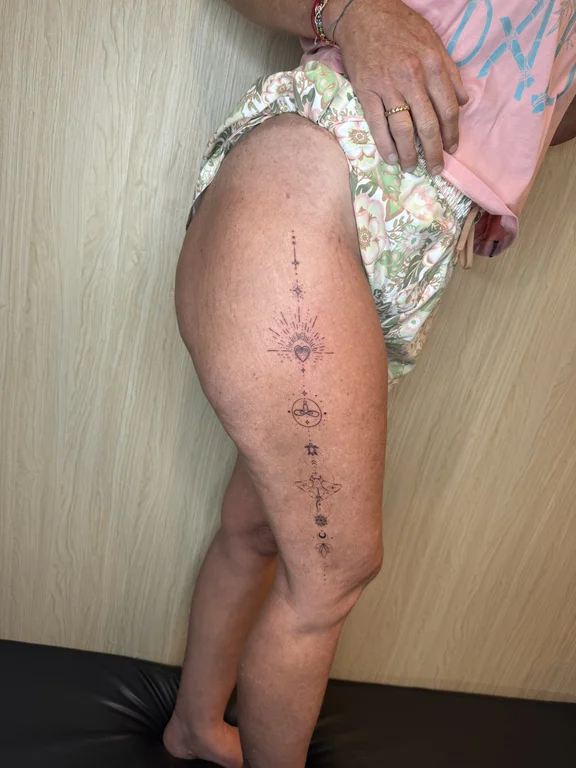 floral traditional woman fine line flower linework soft shading dotwork tattoo Canggu Bali