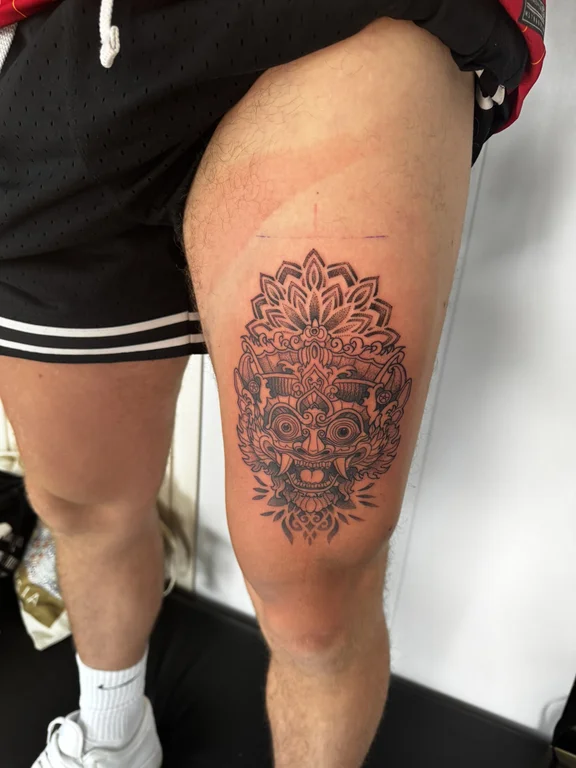 mandala traditional deity balinese pattern sun dotwork linework black grey tattoo Canggu Bali