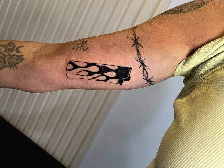 abstract tribal man black grey fire bold line linework tribal pattern tattoo Canggu Bali