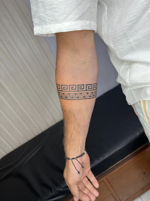 geometric blackwork man thin line elegant fine line black grey linework tattoo Canggu Bali