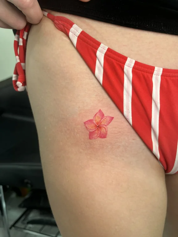 symbol traditional lotus fine line sun bold line soft shading colorful tattoo Canggu Bali